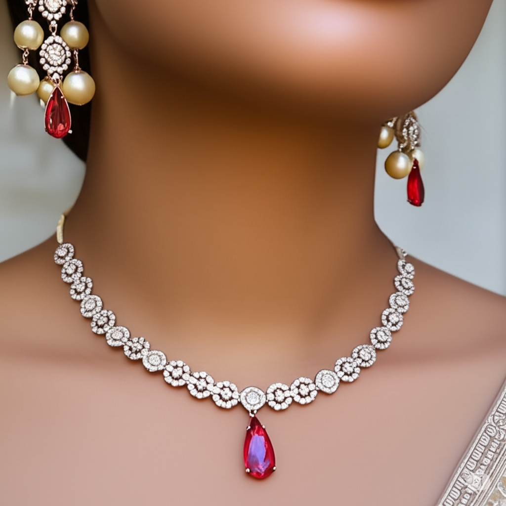 An elegant water droplet necklace with American Diamonds in pink colour