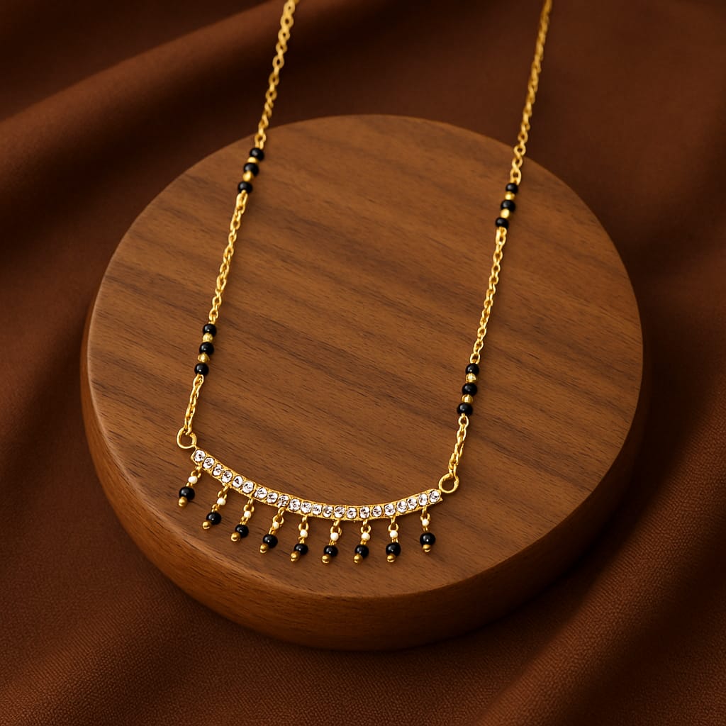 Sneha short mangalsutra chandrakor with hanging black beads