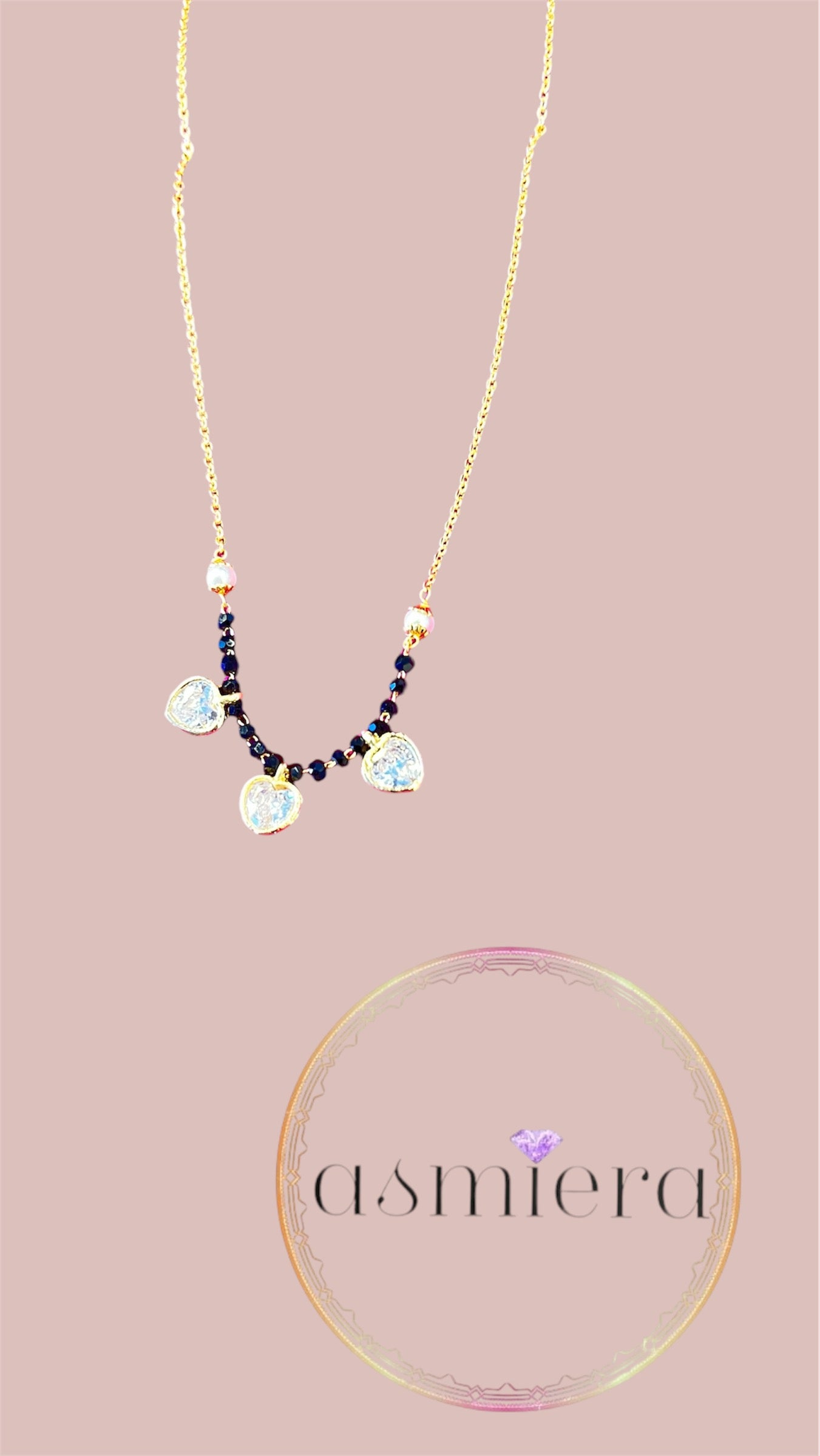 Menka Short Mangalsutra with three little hearts .
