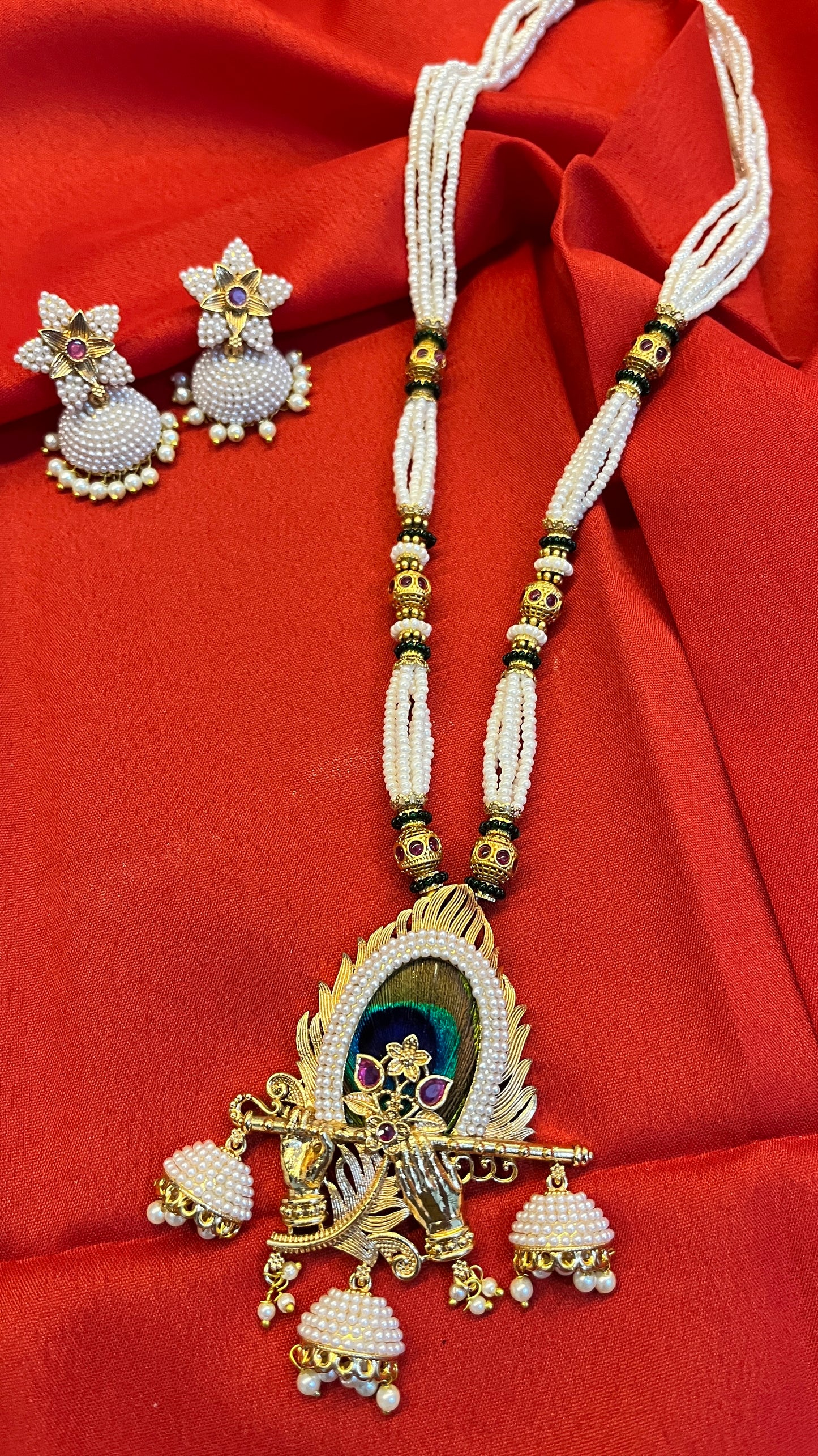 Necklace with krishna flute and original peacock feather